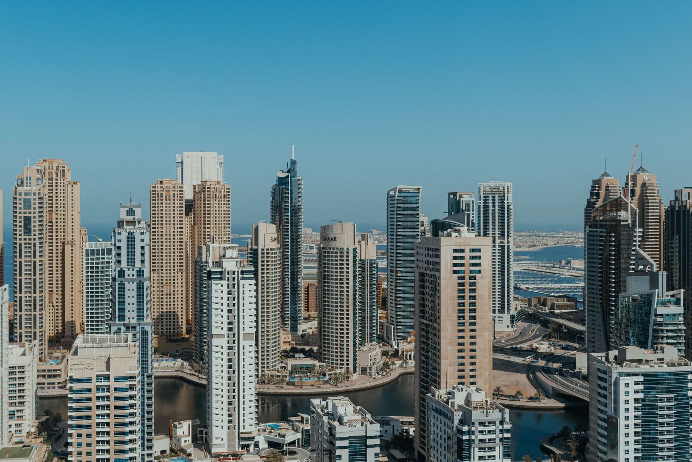 Residential apartment towers overlooking the water in Dubai Marina on a clear day